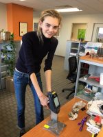 Meet Molly Bair: Superstar Model, Pure Earth Pollution Fighter. After a quick lesson at Pure Earth’s office, Molly shows off her skills with the XRF–a handheld X-ray fluorescent analyzer that can identify toxic particles in soil in about 30 seconds.
