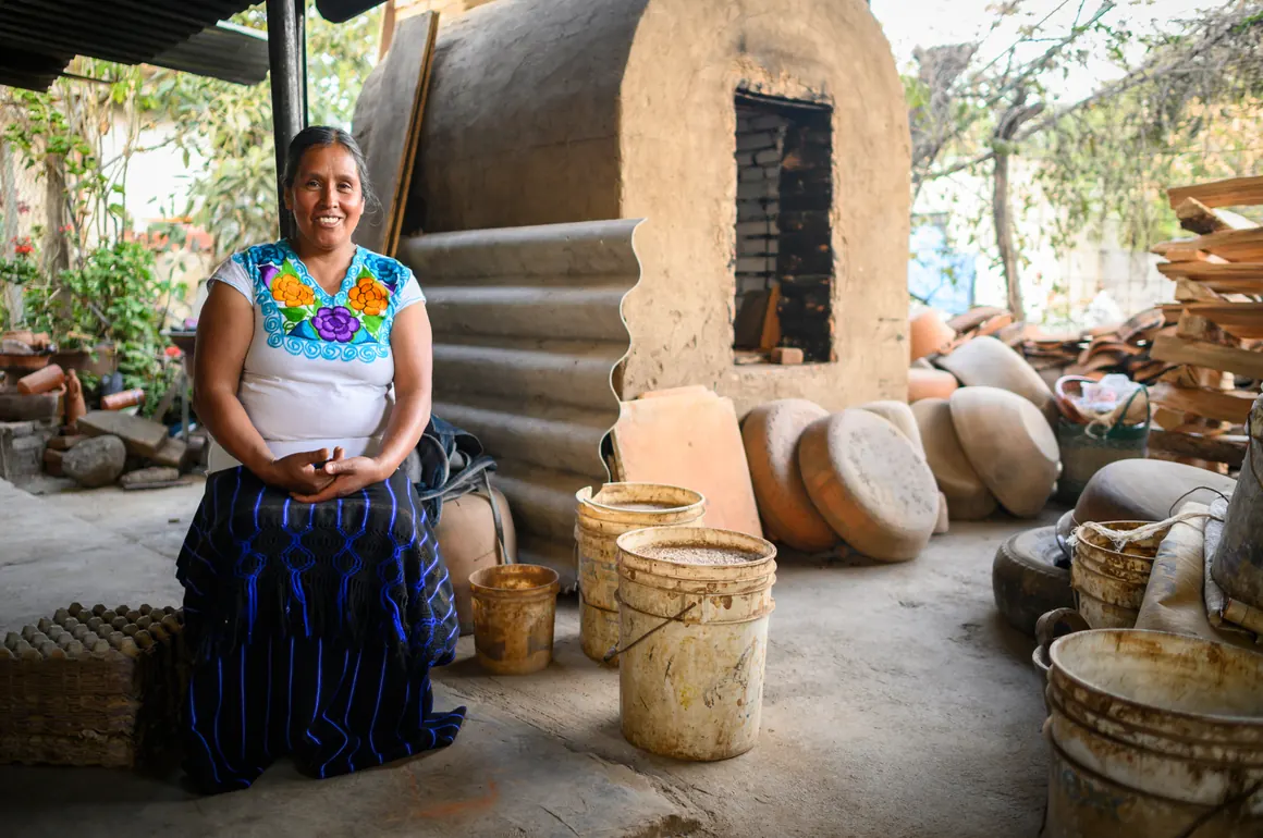 A potter in Mexico shapes clay by hand. Pure Earth trains artisans to switch to lead-free glazes and upgraded kilns.
