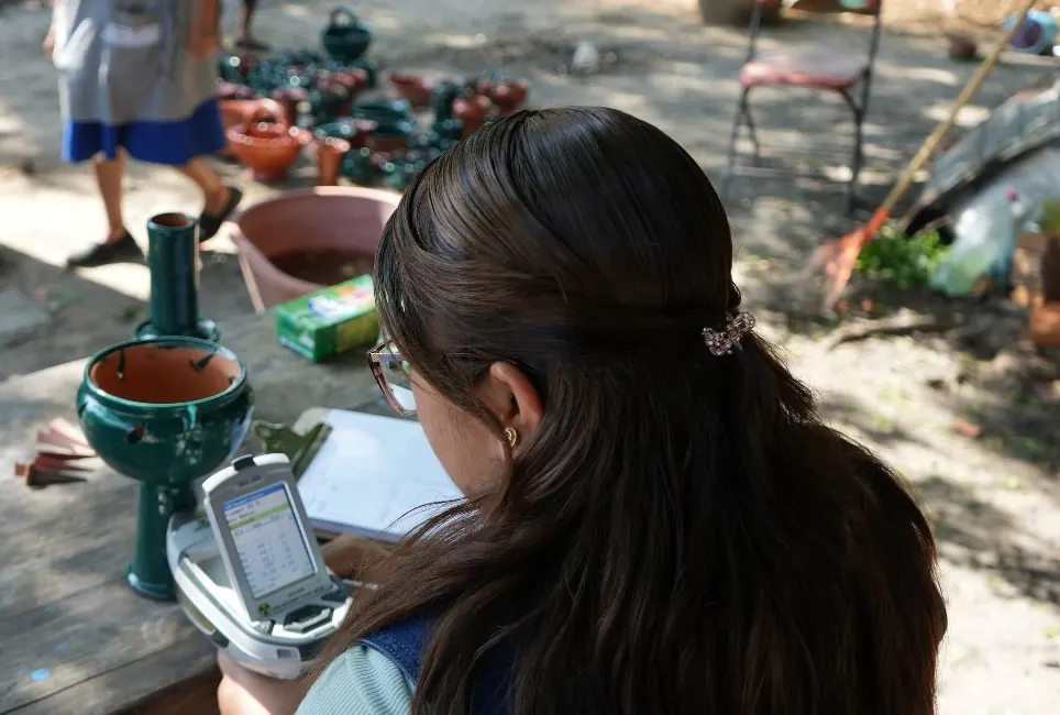 A Pure Earth team member tests pottery glaze for lead in Mexico.